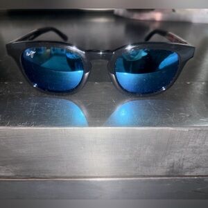 Maui Jim Black Frame Sunglasses with Blue Mirrored Lenses